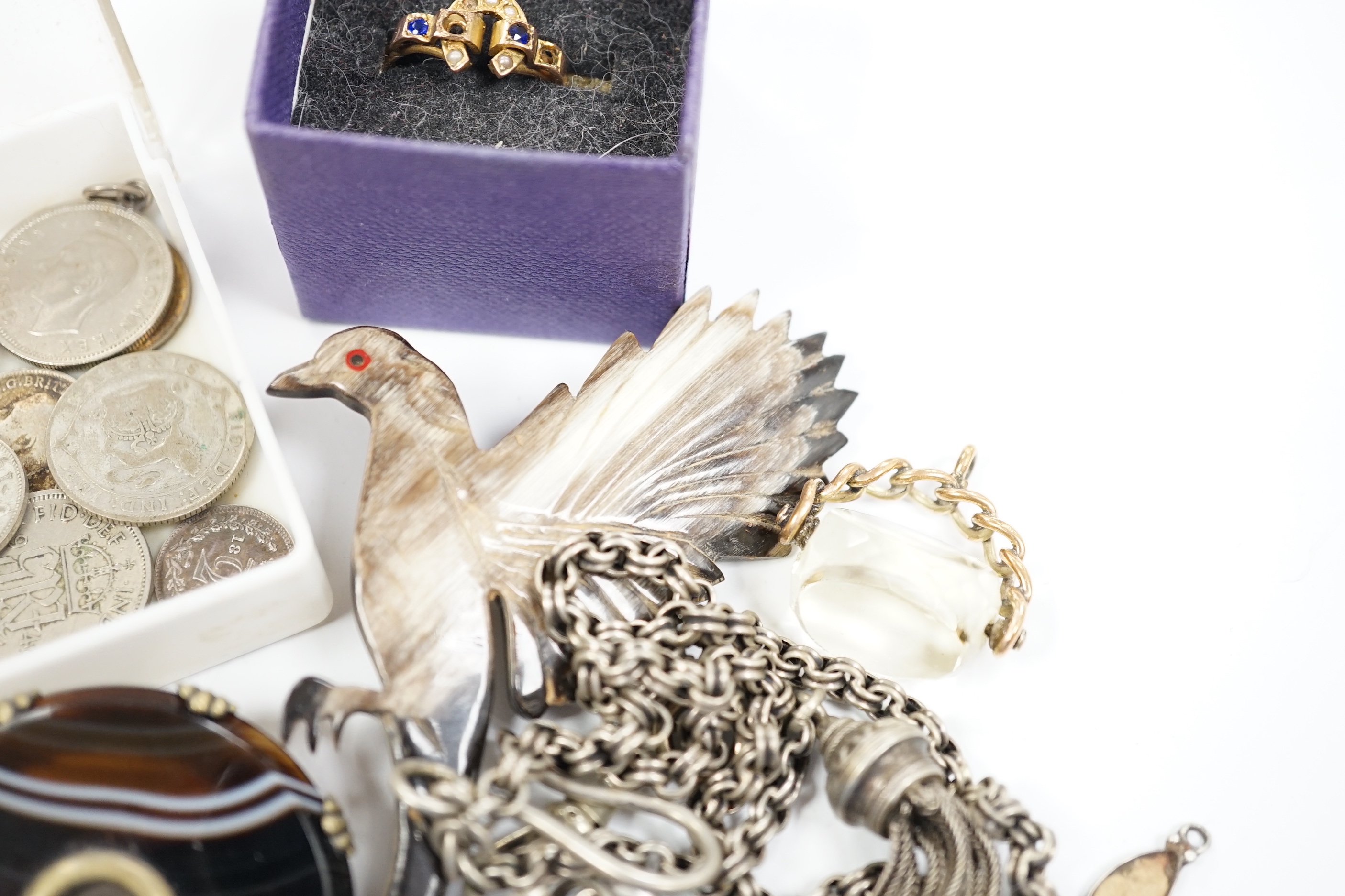 A small quantity of assorted jewellery including a late Victorian silver name brooch 'Polly', 42mm, a late Victorian 9ct gold and gem set horseshoe ring (stones missing), a late Victorian silver and carnelian set signet